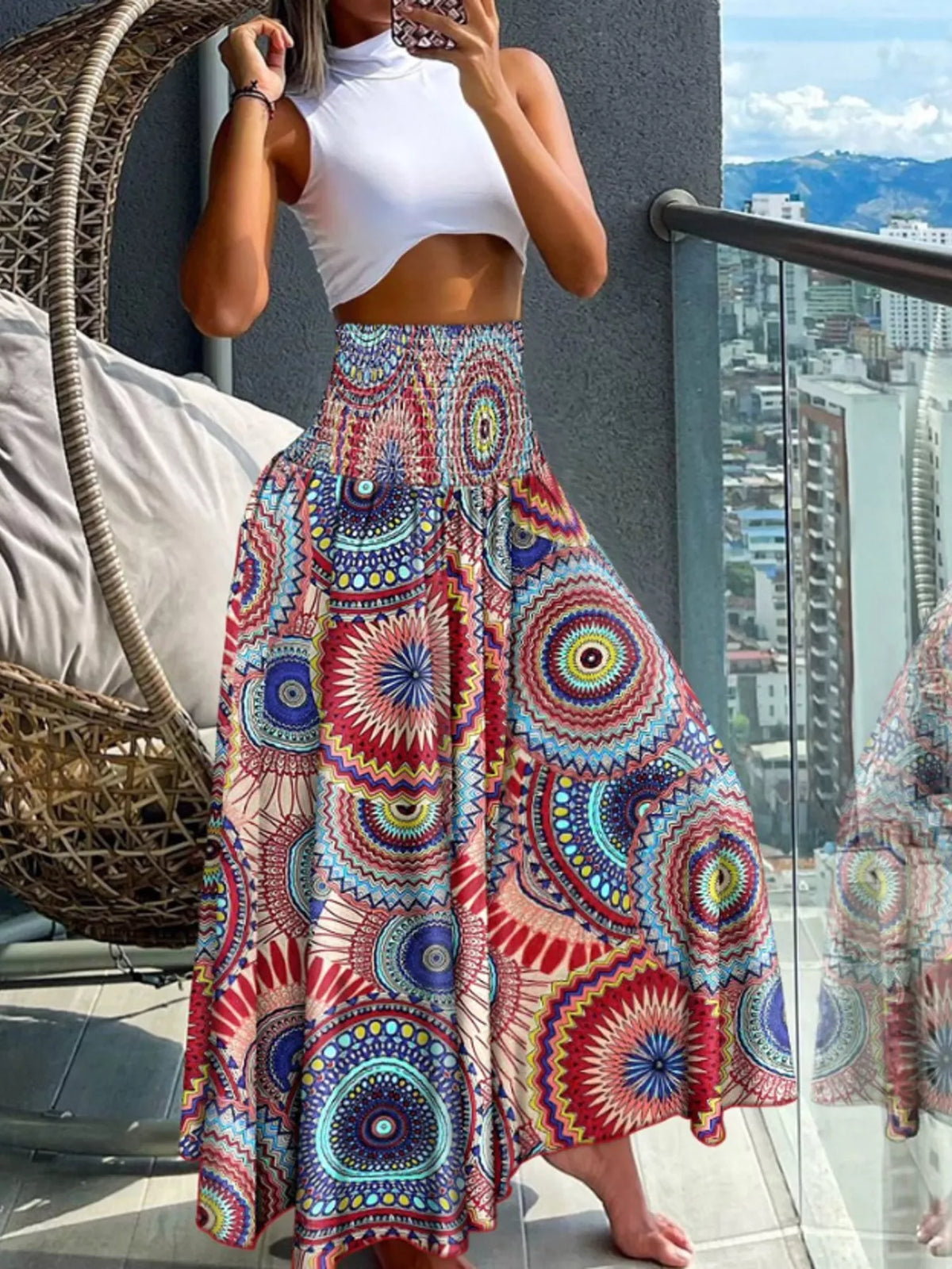 Printed wide-leg pants from Plush Fashion Hub with a relaxed fit and vibrant floral pattern, shown on a model.