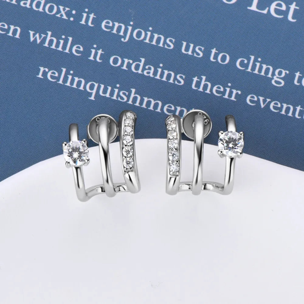 Sterling silver moissanite earrings featuring sparkling gemstones, elegant jewelry piece from Plush Fashion Hub.