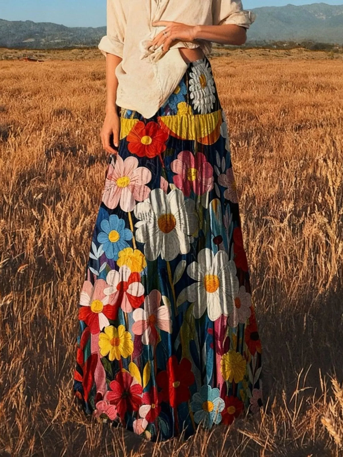 Floral print high-waisted maxi skirt from Trendsi, flowing fabric with vibrant flower patterns, perfect for summer or casual wear.