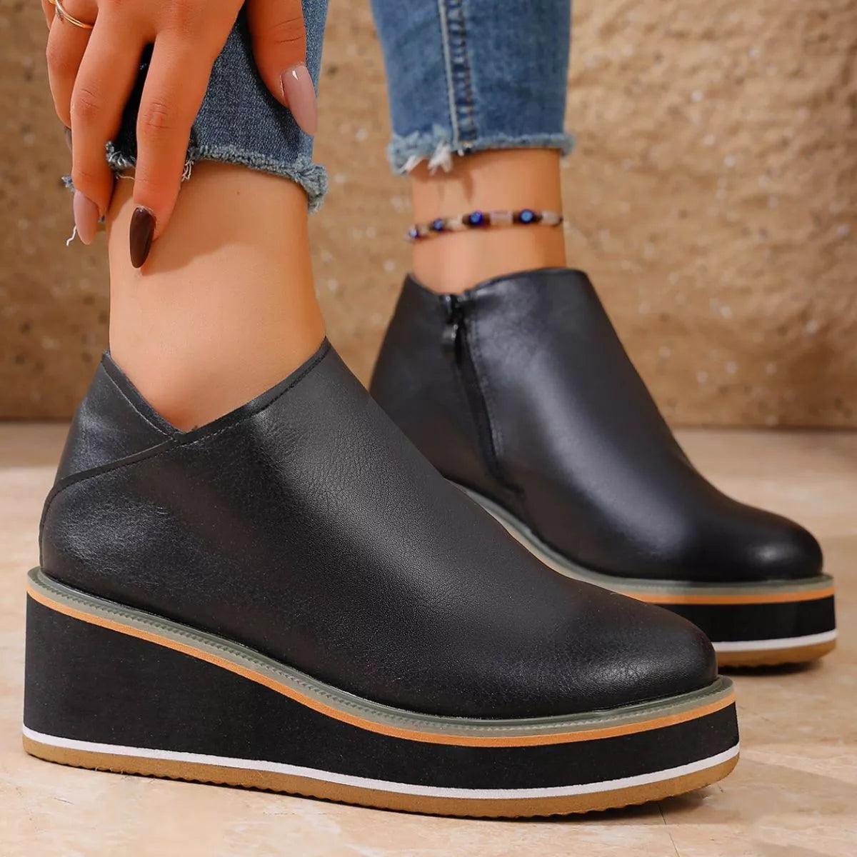 Women's round toe wedge ankle boots by Trendsi featuring stylish design and comfortable fit, shown in the product image.