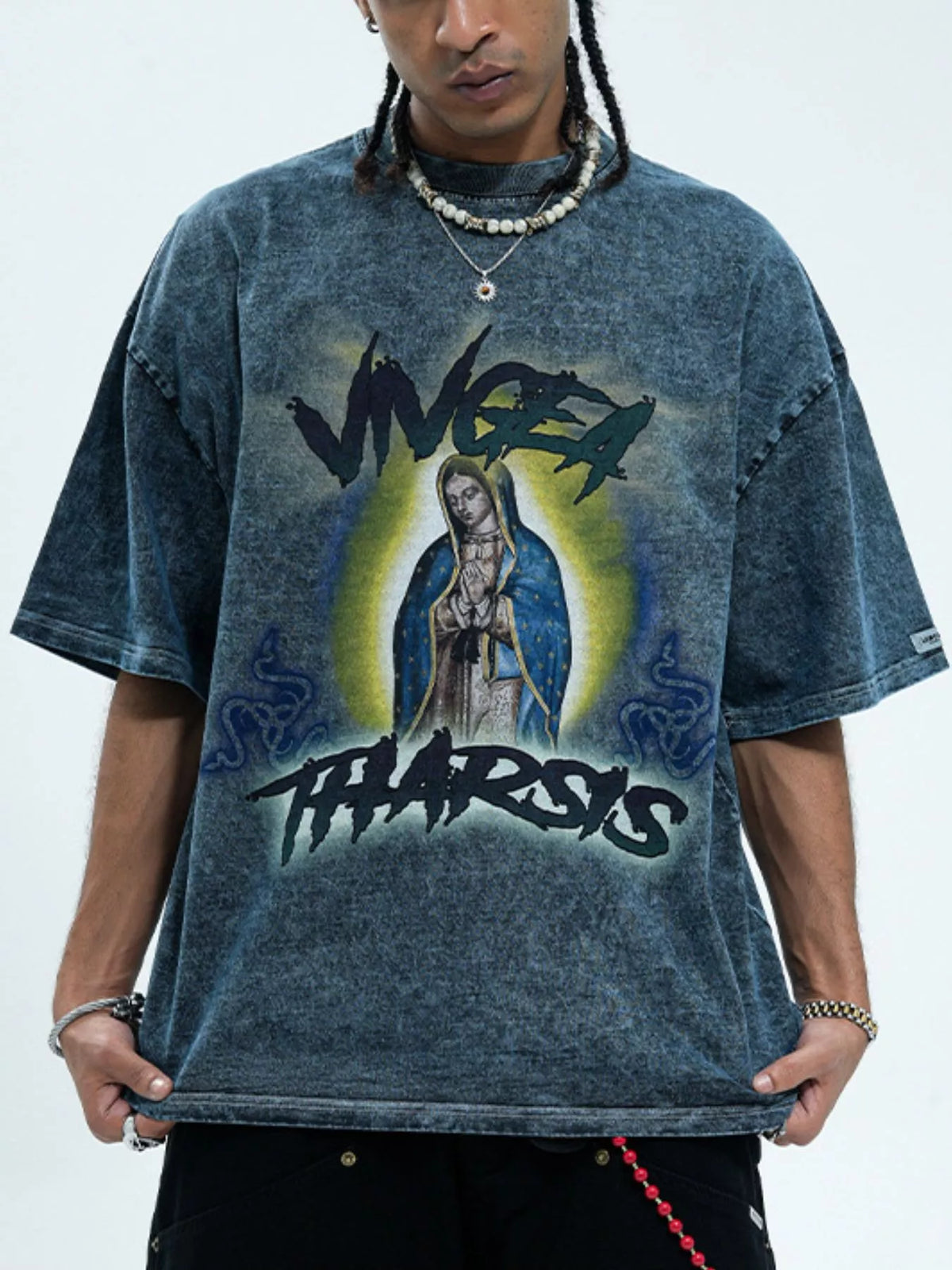 Men's graphic round neck short sleeve T-shirt by Trendsi, featuring a bold printed design on soft fabric.