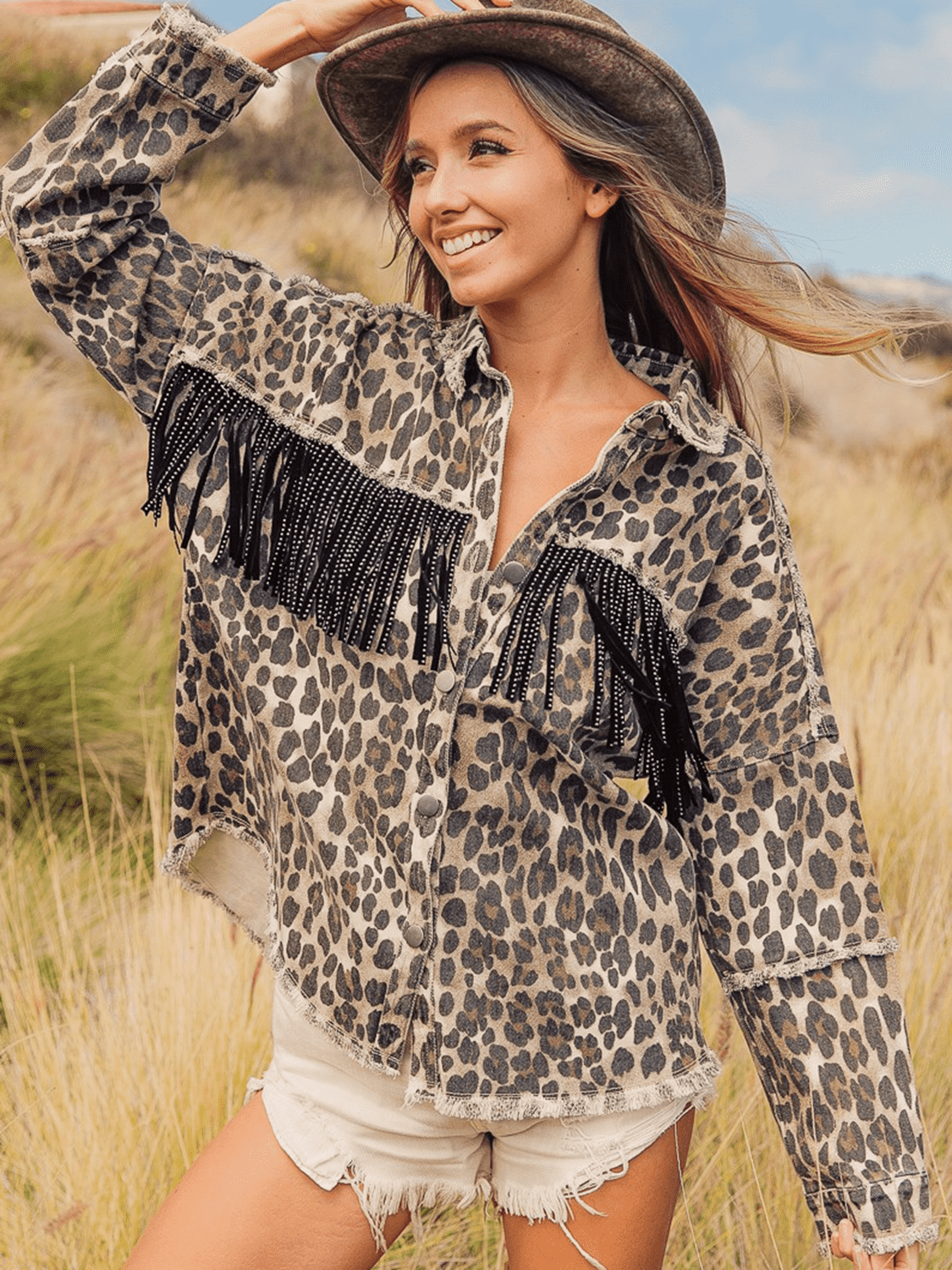 Leopard fringe detail collared denim jacket from Plush Fashion Hub, featuring leopard print accents and stylish collar design.