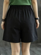 Casual elastic waist shorts by Trendsi featuring a relaxed fit, lightweight fabric, and versatile style for everyday wear.