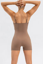 Trendsi spaghetti strap round neck activewear romper with sleeveless design and relaxed fit, perfect for casual and workout wear.