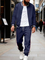 Men's plus size striped snap-down top and pants set from Trendsi, featuring a coordinated full-size men's outfit with bold stripes.
