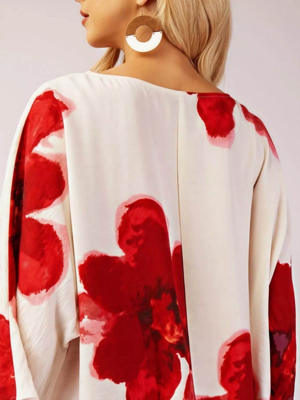 Floral print round neck dress by Plush Fashion Hub featuring vibrant floral patterns and a classic round neckline.