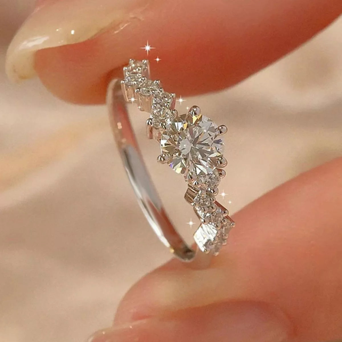 925 Sterling Silver Moissanite Ring with 2 Carats, featuring a sparkling central stone and intricate band design.