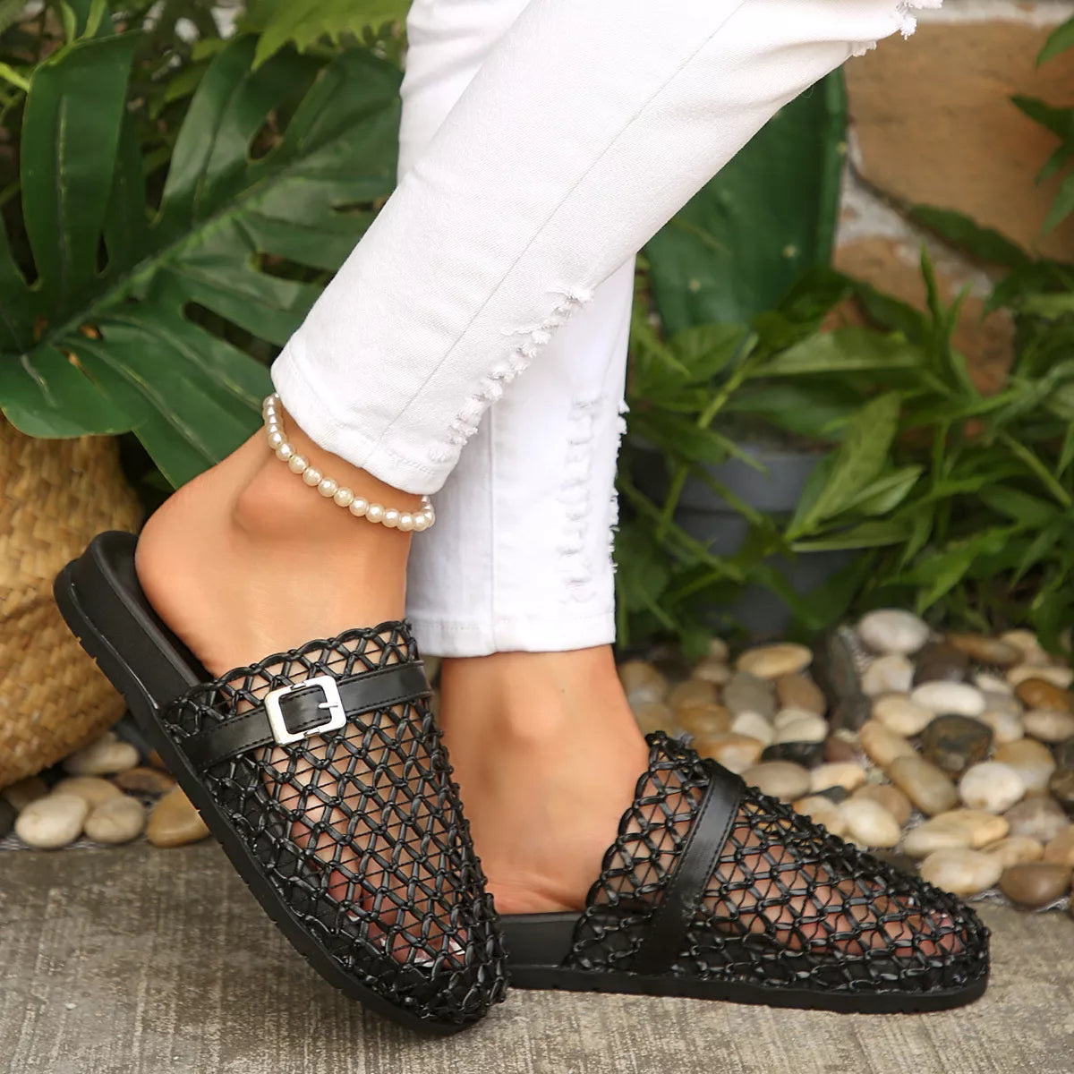 Plush Fashion Hub round toe buckle sandals featuring a stylish strap design and comfortable flat sole.