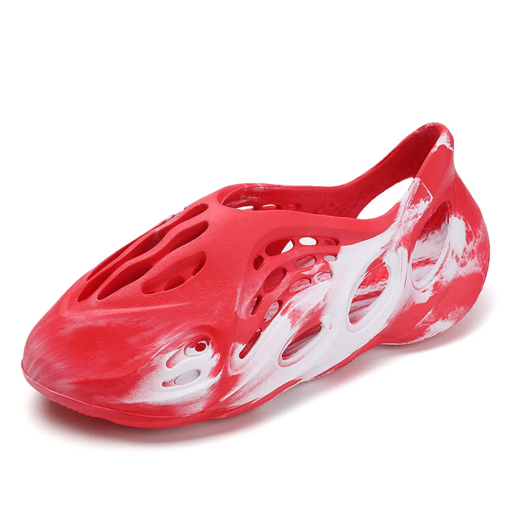 Trendsi hollow-out flat sandals with open toe design, stylish footwear featuring cut-out details and ankle straps.