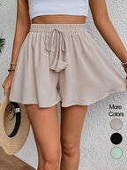 Flowy drawstring waist romper shorts from Trendsi, featuring lightweight fabric and casual style, shown in the product image.