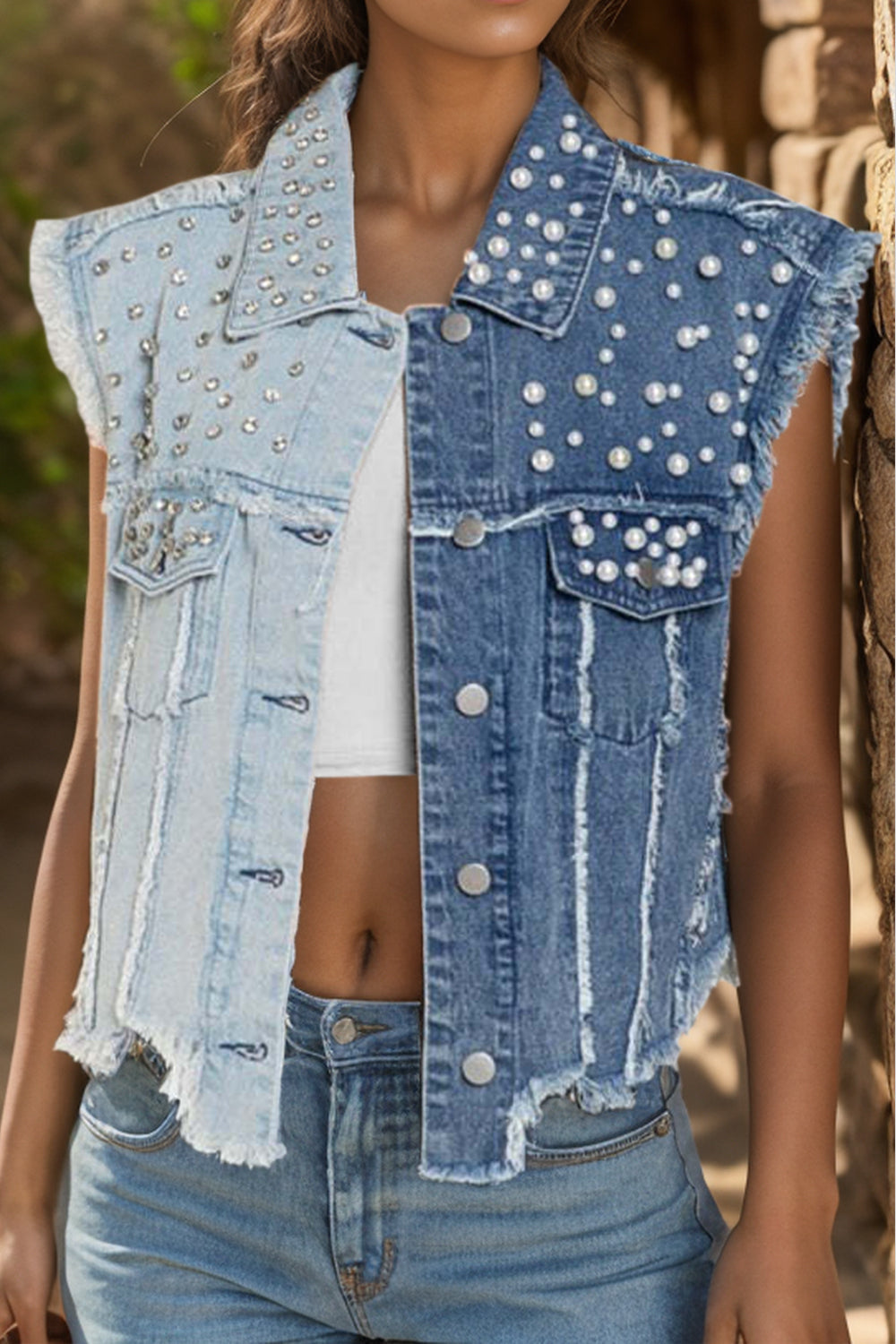 VYSN Pearl Raw Hem Sleeveless Denim Jacket featuring pearl embellishments and casual sleeveless design, front view.
