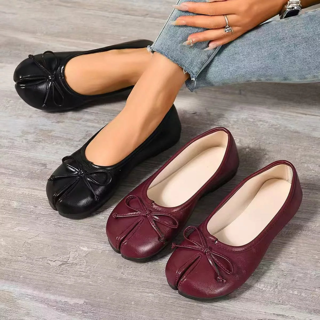Trendsi Bow Decor Split Toe Slip-On Shoe featuring stylish bow detail and comfortable design, ideal for casual or dressy wear.