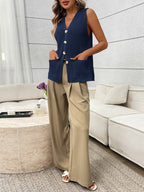 Women's sleeveless knit sweater vest with buttons and side pockets, stylish Trendsi sweater for layered fall or winter looks.