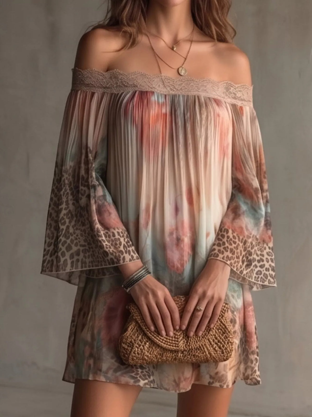 Off-shoulder floral and leopard print mini dress with lace trim from Trendsi, showcasing the stylish neckline and vibrant pattern.