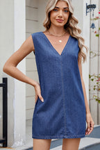 VYSN V-neck sleeveless denim dress displayed on a hanger, showcasing its casual, sleeveless design and classic blue denim fabric.