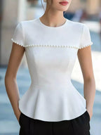Pearl embellished peplum T-shirt from Shopimist, stylish tops with elegant pearl details and a fitted peplum design.