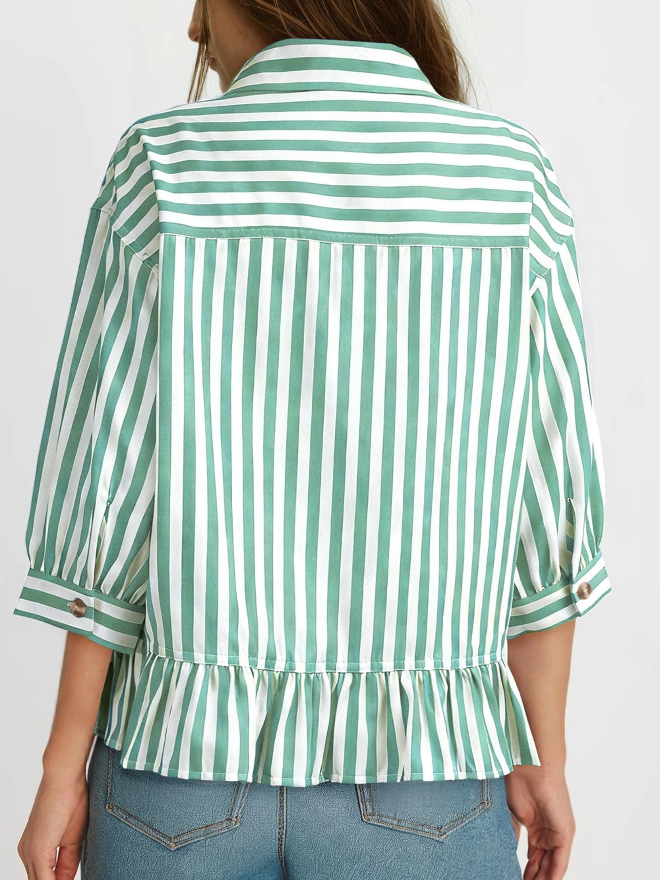 Women's striped button-down blouse with ruffled hem, lightweight viscose fabric, from Trendsi.