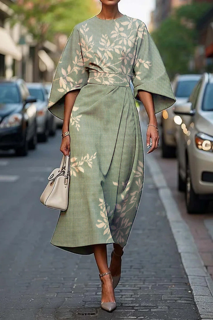 Flowy maxi dress with geometric print and batwing sleeves by Plush Fashion Hub, casualwear style for sizes XS to XXXL.