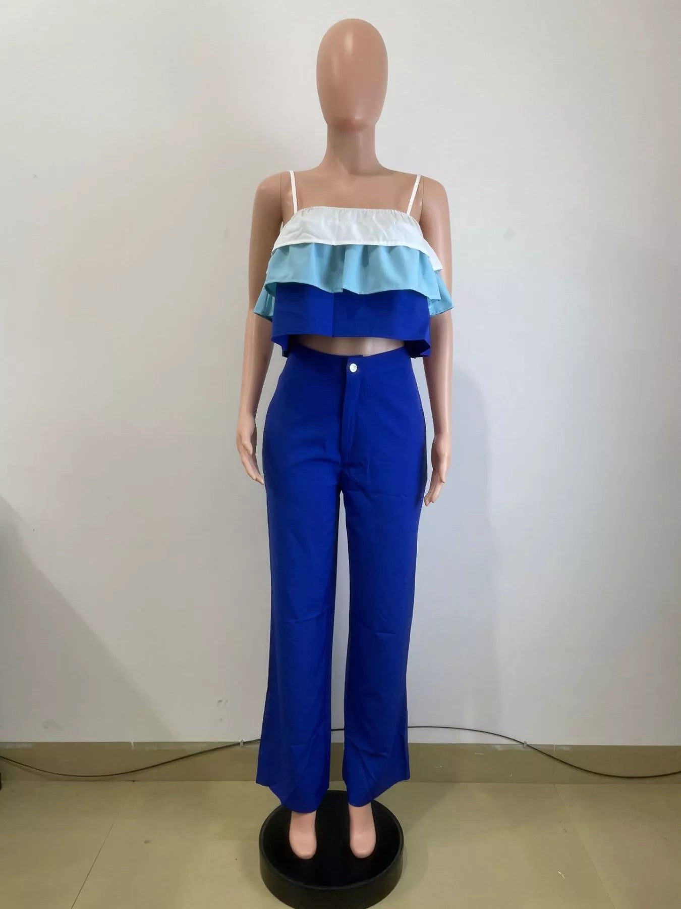 Layered ruffle crop top and pants set from Shopimist, featuring a stylish, coordinated look with layered ruffle details.