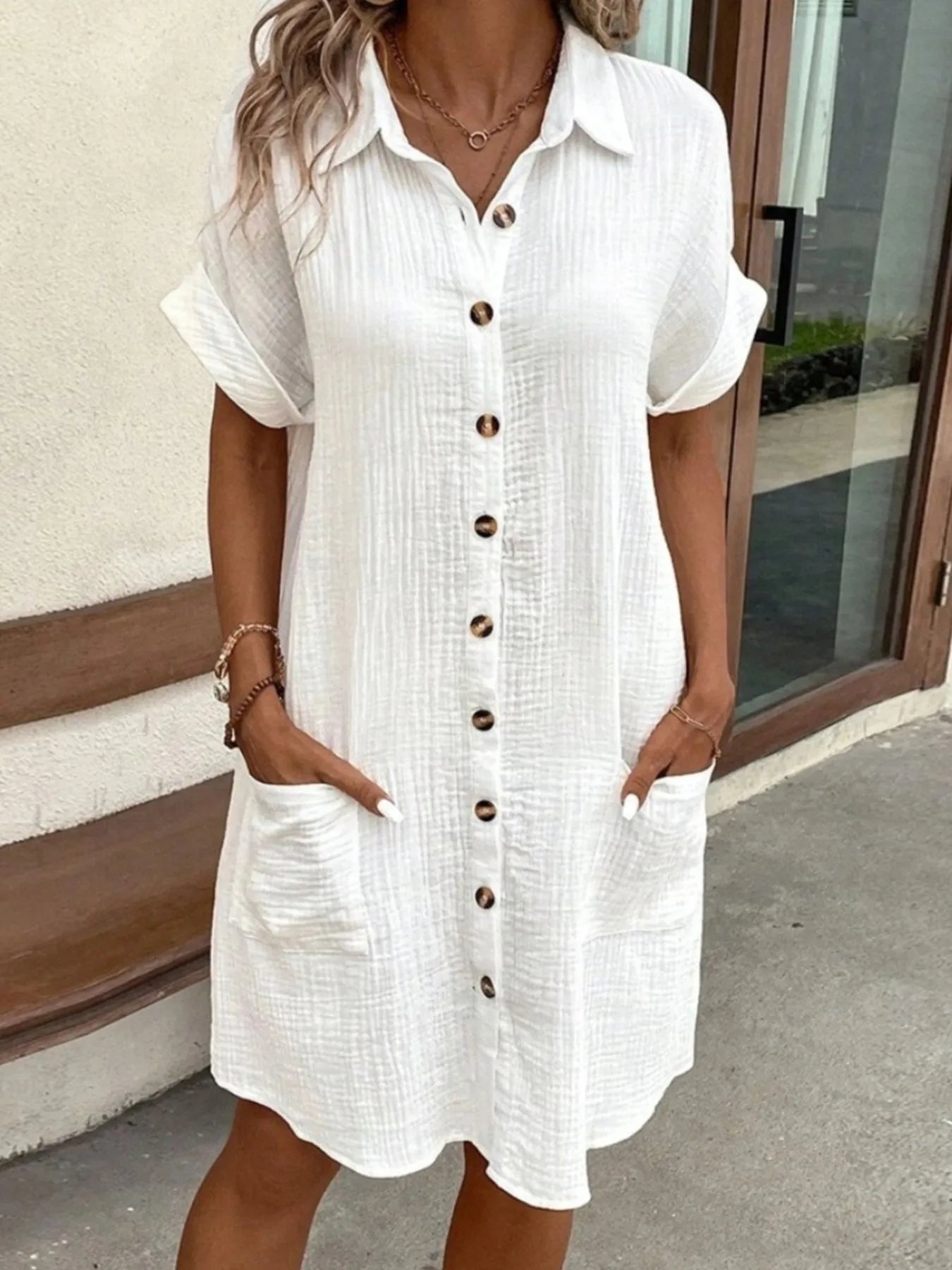 Plush Fashion Hub casual button-down shirt dress with pockets, featuring a relaxed fit and comfortable fabric.