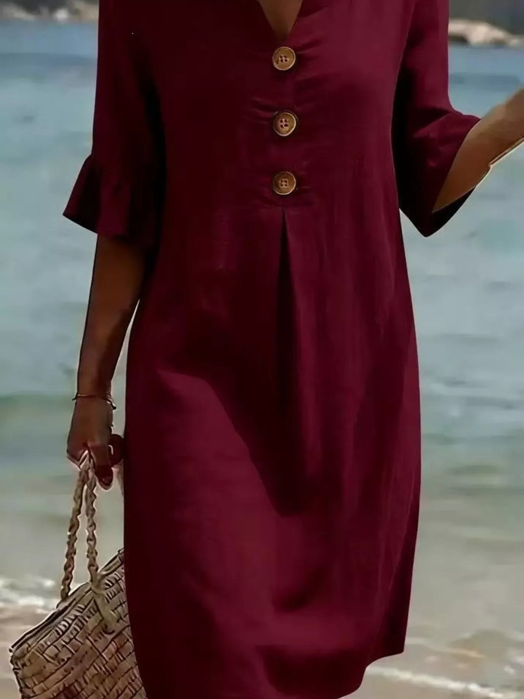 Plus size Trendsi midi dress with ruffle sleeves and button decor, featuring a full-size button design and stylish silhouette.