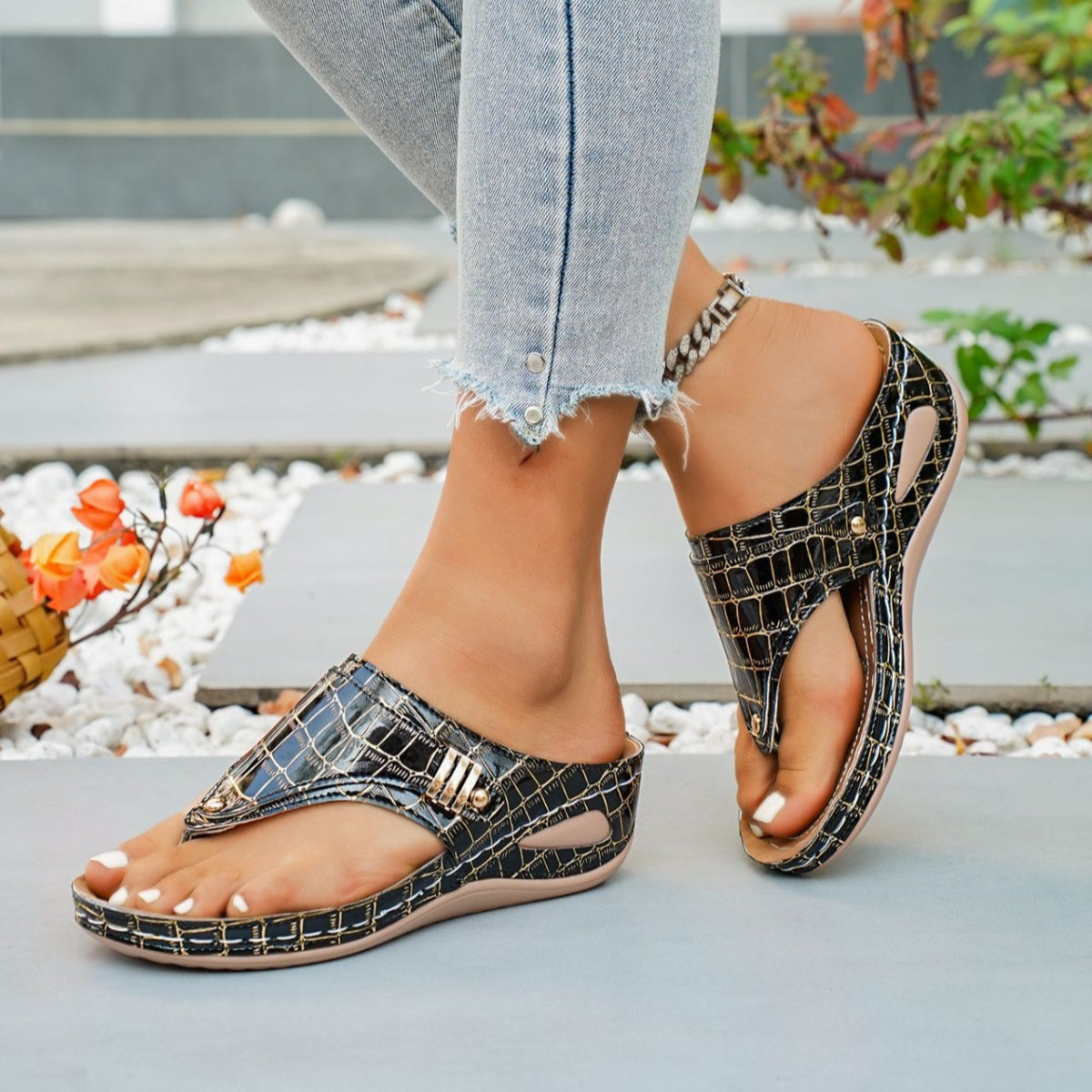 Women's faux leather toe post wedge sandals with mid-heel and comfortable design, featuring stylish straps and casual summer look.