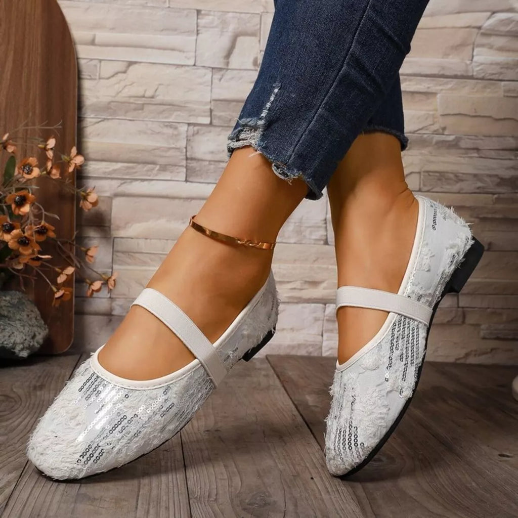 Women's sparkling sequin slip-on flats with round toe from Trendsi, featuring glamorous design and comfortable fit.