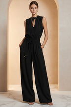 Women's sleeveless high-waist wide-leg pleated jumpsuit in casualwear style from Plush Fashion Hub.