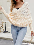 Cable knit batwing sleeve sweater from Trendsi, featuring a cozy textured design and relaxed fit, ideal for casual wear.
