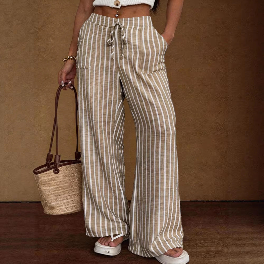 Women's striped wide-leg trousers with lace-up elastic waist and loose fit, stylish and comfortable from Plush Fashion Hub.