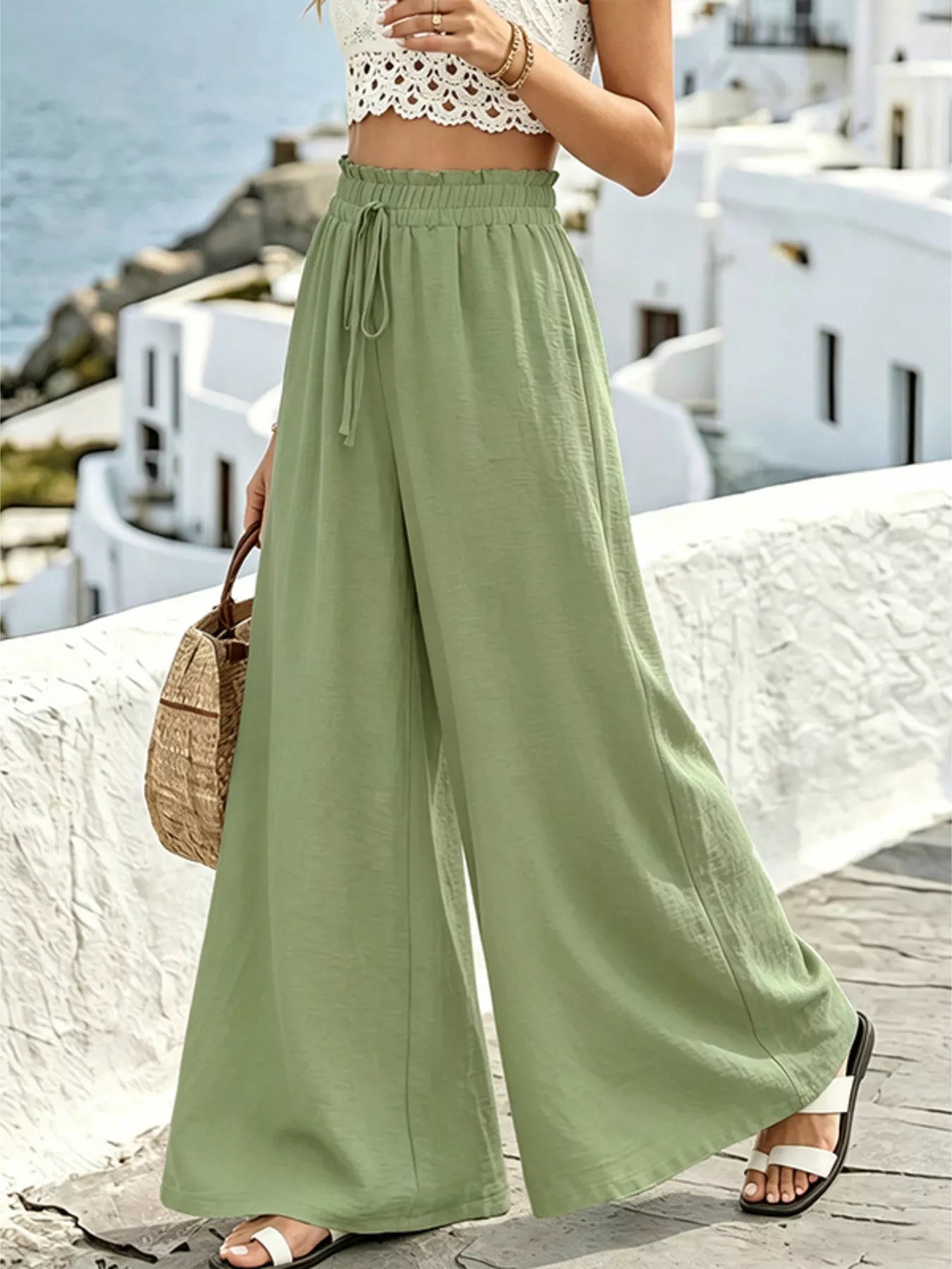 Wide leg drawstring pants from Plush Fashion Hub with a relaxed fit and comfortable waistband, shown on a model.