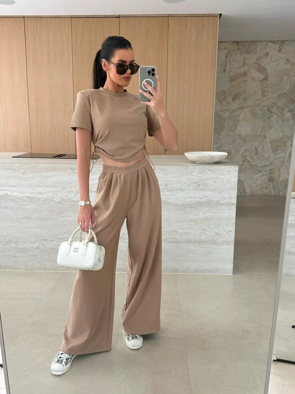Drawstring crop top and wide-leg pants set by Plush Fashion Hub, featuring a stylish coordinated outfit with a comfortable fit.
