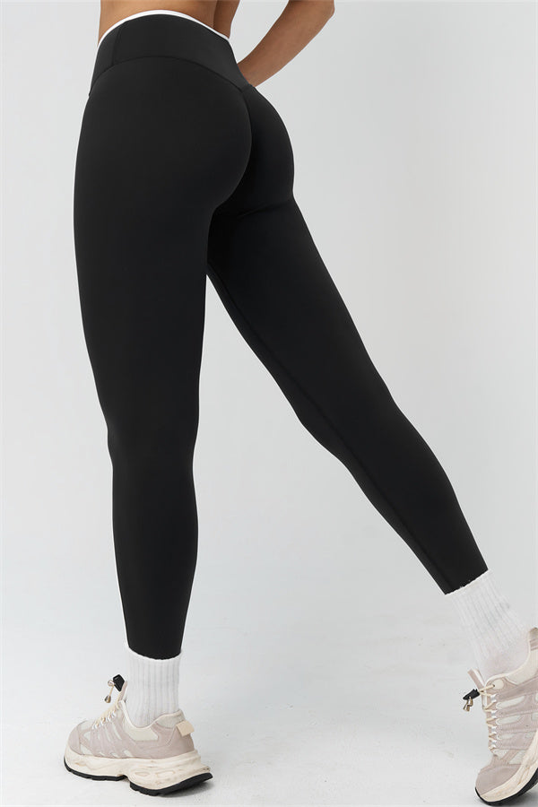 Fitglutes Activewear sports bra and leggings set with contrasting colors, designed for workout and gym activities.