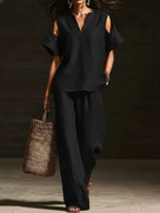 FitiqueFit two-piece V-neck short sleeve top and straight-leg pants set with ripped details, pockets, in a solid color.