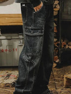 Men's washed wide leg cargo jeans by Trendsi, showing relaxed fit with multiple cargo pockets and distressed denim finish.