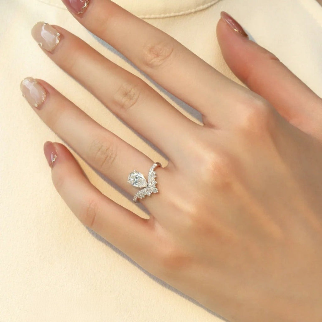Sterling silver 1.5 carat moissanite ring with a sparkling gemstone and elegant design, showcasing fine craftsmanship.