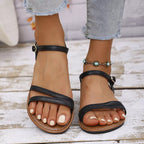 Open toe flats sandals by Shopimist featuring a sleek design with comfortable straps and a stylish flat sole.