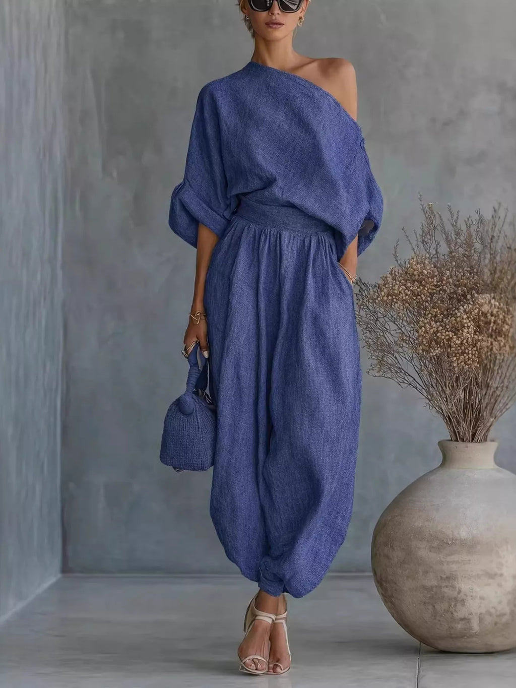 Trendsi one-shoulder loungewear set with matching joggers, stylish and comfortable for casual wear, shown in a relaxed fit.