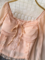 Women's elegant frill flounce sleeve smocked blouse made of lightweight polyester, stylish dress by Trendsi.