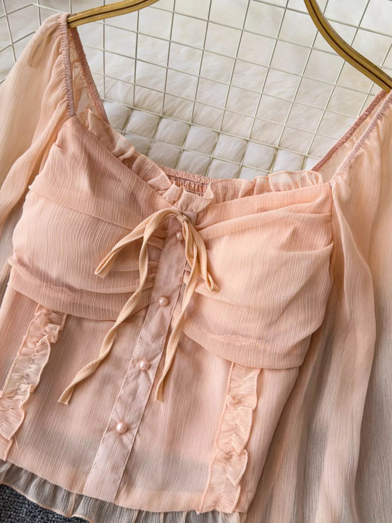Women's elegant frill flounce sleeve smocked blouse made of lightweight polyester, stylish dress by Trendsi.