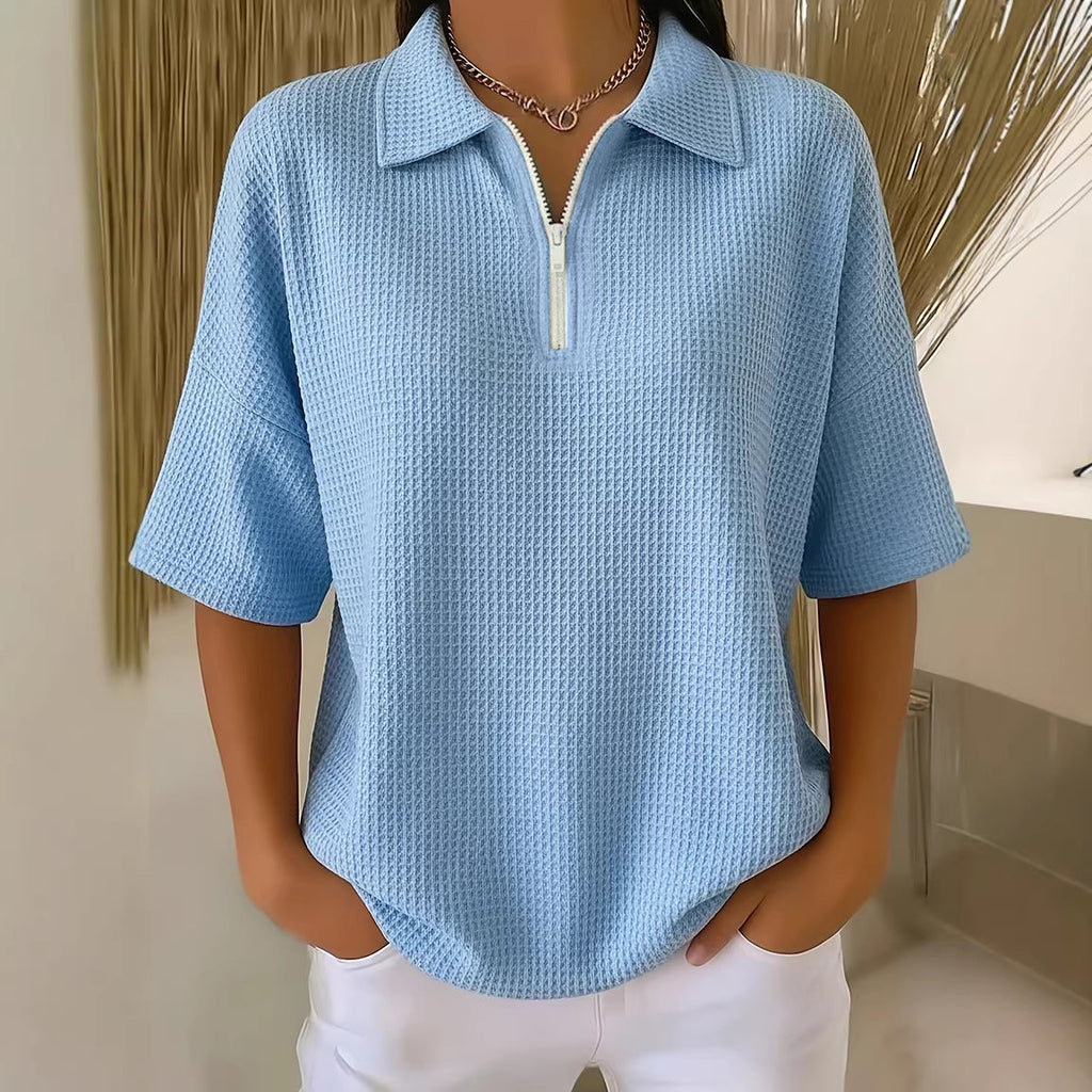 FitiqueFit drop shoulder waffle knit top with 3/4 sleeves, featuring a half-zip pullover design and cozy textured fabric.