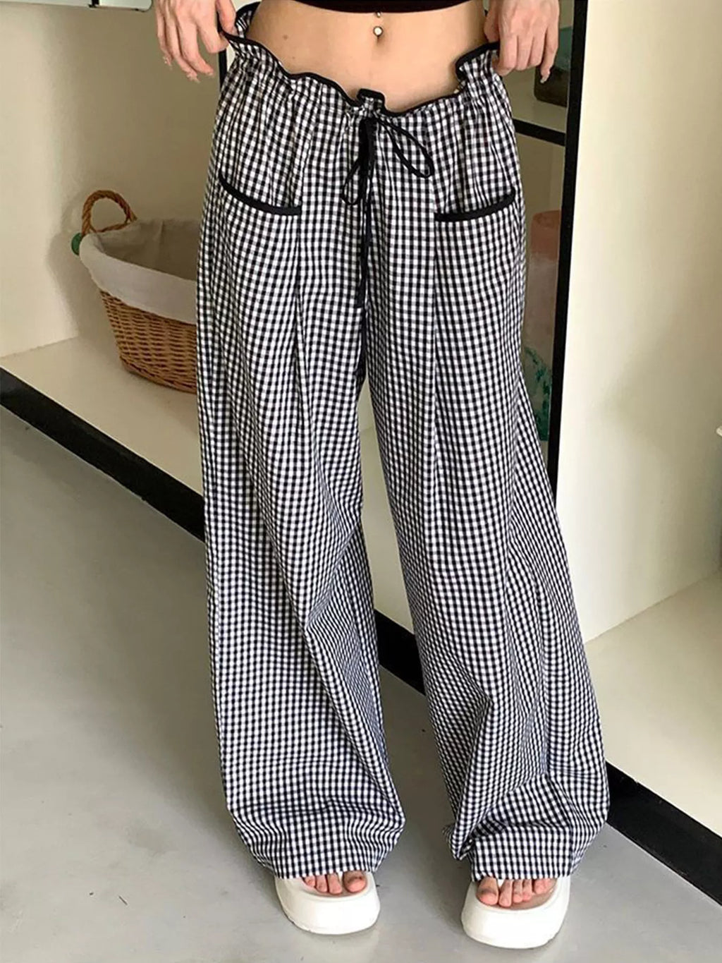 Women’s high-waisted gingham wide-leg pants with pockets, trendy fashion pants by Trendsi, shown in a stylish gingham pattern.