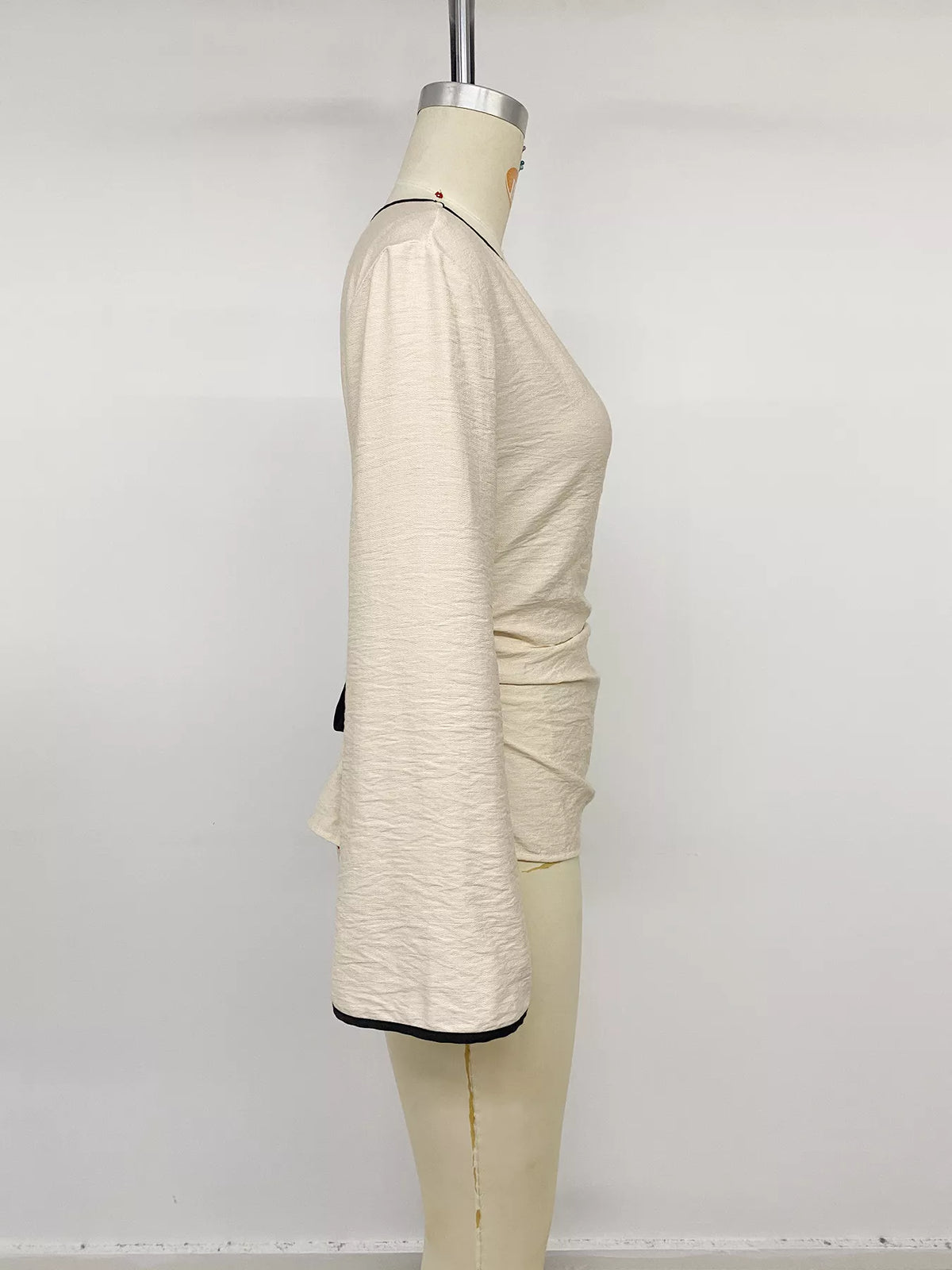 Plush Fashion Hub contrast trim flare sleeve blouse with stylish design and elegant details on a white background.
