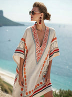 Women's printed loose A-line beach midi dress by FitiqueFit featuring a flowy design and vibrant vacation resort print.