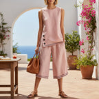 Women's tank top and wide-leg pants set by Plush Fashion Hub with side splits, pockets, and button details.