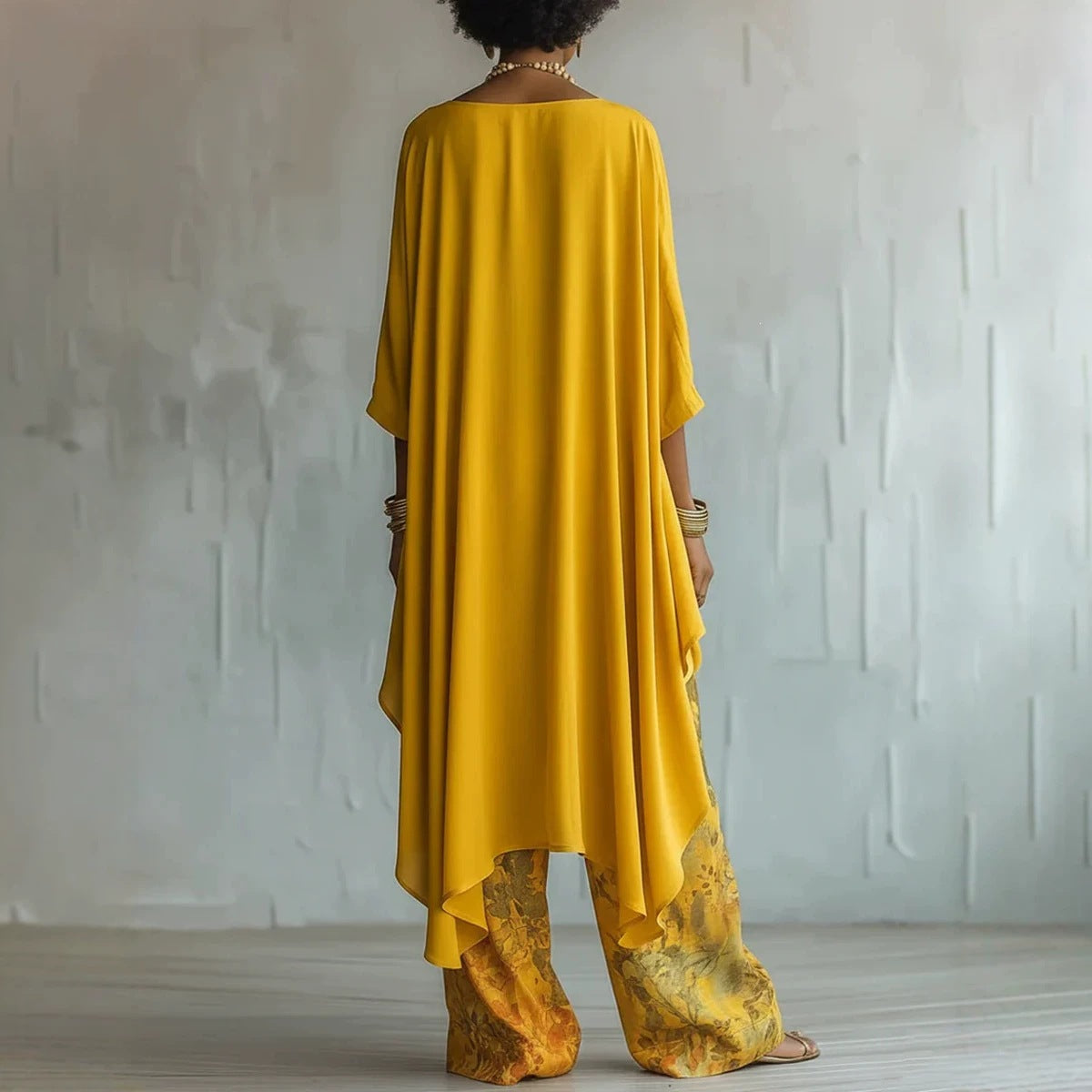 FitiqueFit solid color sleeveless top and wide-leg pants two-piece set, shown in a casual, stylish outfit.