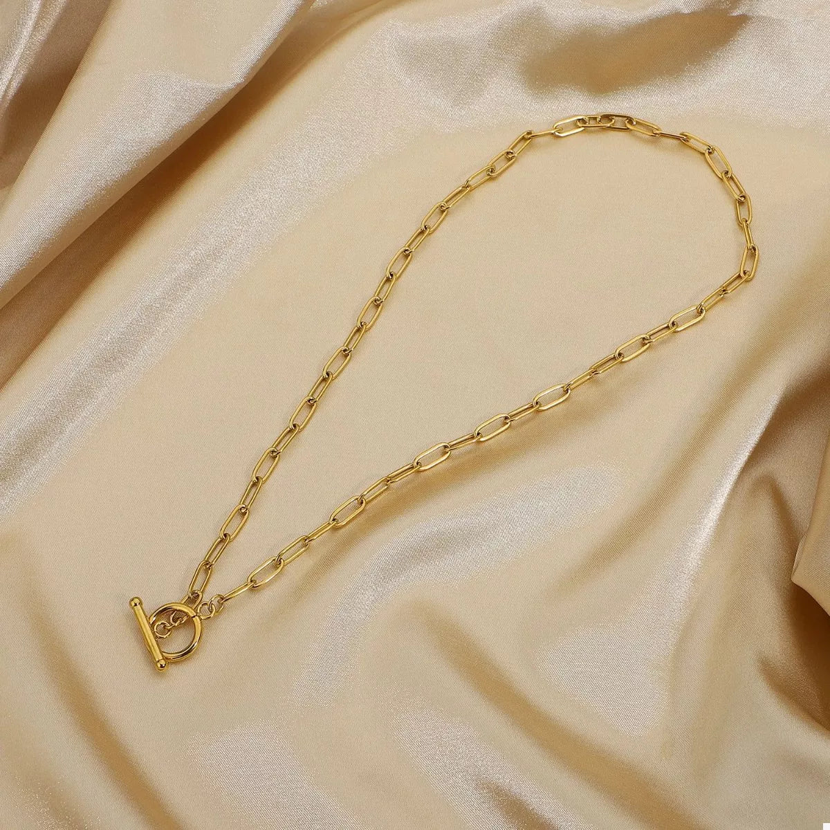 18K gold-plated chain link toggle clasp necklace with a stylish design, perfect for adding elegance to any outfit.