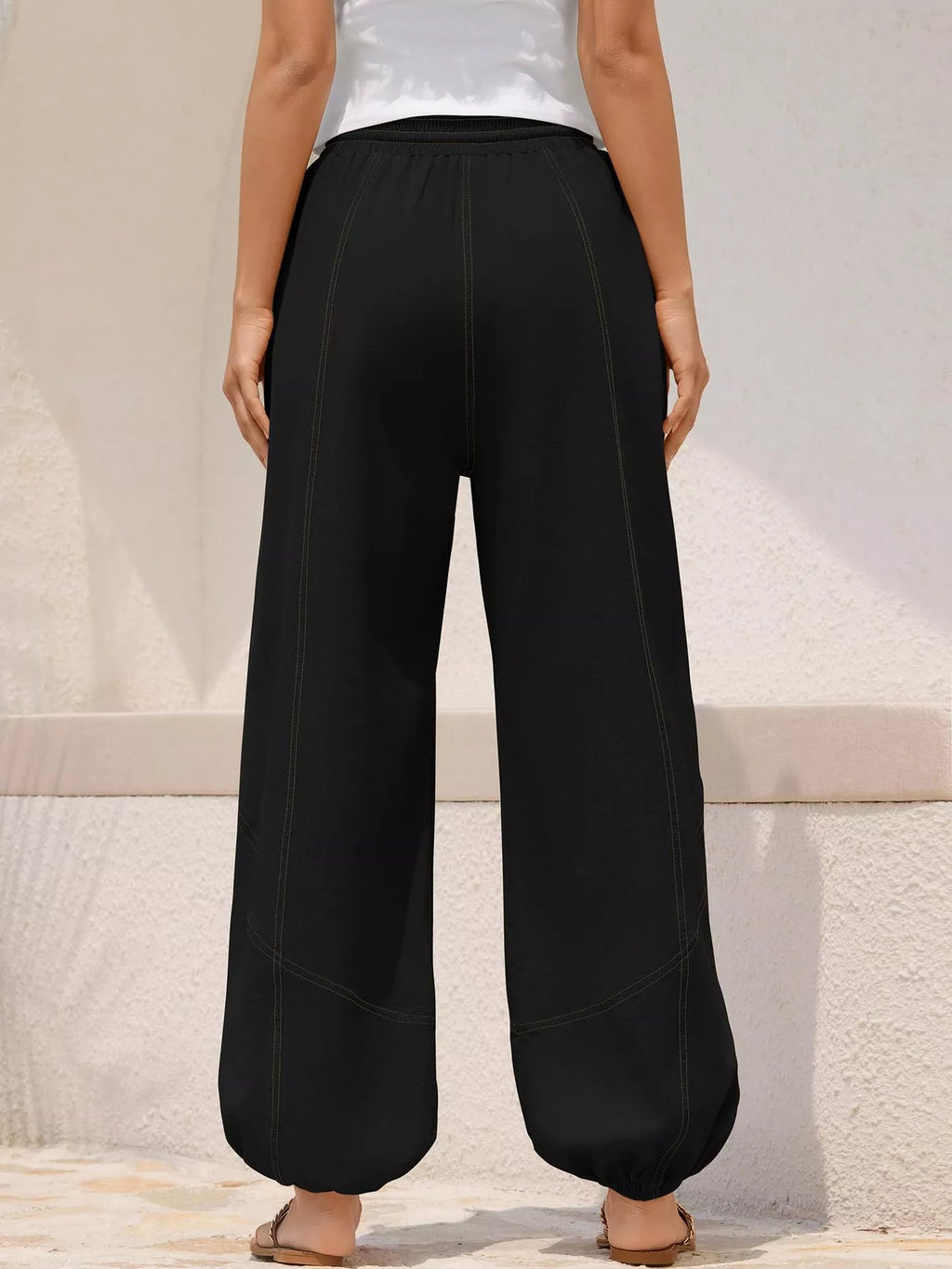 Casual loose fit harem joggers with drawstring waist from Trendsi, featuring relaxed style and comfortable fit, shown in the image.