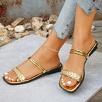 Shopimist rhinestone strappy flat sandals with elegant rhinestone embellishments and adjustable straps on a flat sole.