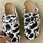 Leopard print Plush Fashion Hub slip-on shoes with half-support design, featuring a casual Peas Shoes style in a stylish print.